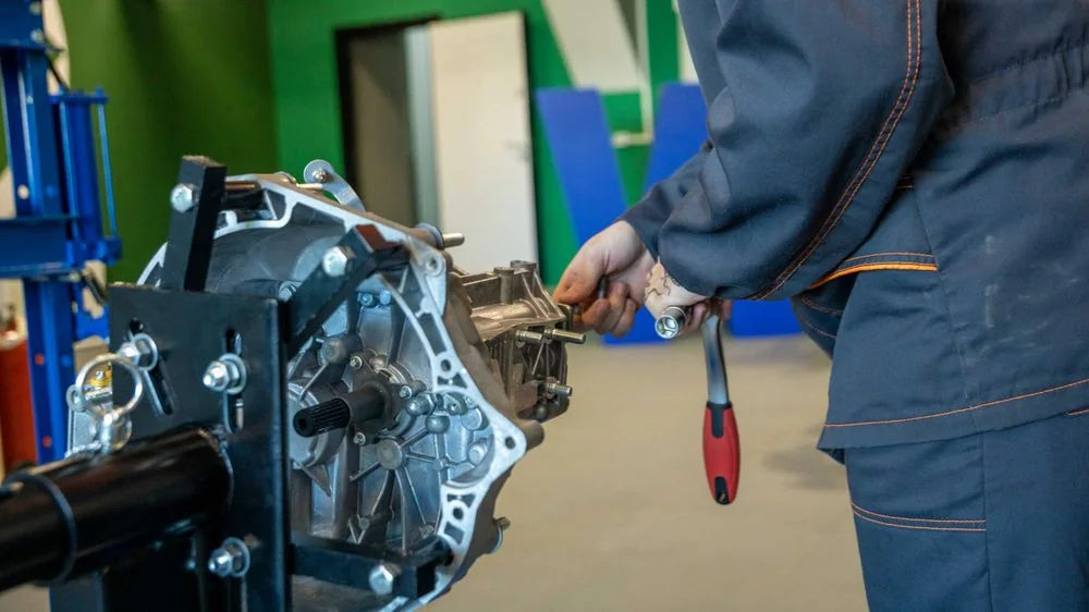 A gearbox out of the car on a workshop stand
